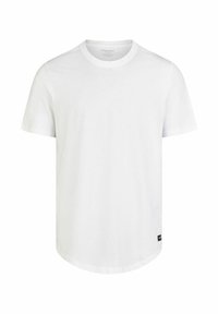 T-shirt bianco a maniche corte in cotone, con scollatura rotonda, orlo dritto e una piccola etichetta nera del marchio in basso a sinistra.