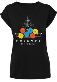 Svart t-skjorte med en grafikk av en fontene med fargerike paraplyer i rødt, blått, gult og oransje, og teksten "F.R.I.E.N.D.S The TV Series."