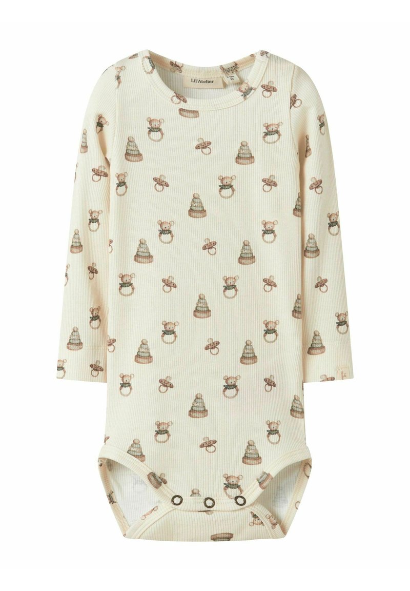 Body bébé à manches longues en tissu côtelé crème avec un motif répétitif d'oursons et de jouets. Comprend des pressions à la base.