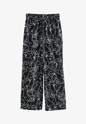 Mustad vabaajajalanõud valge kassi ja kuu mustriga, millel on elastne vöökoht ja lai sääredisain. Pehme ja kerge kangas.