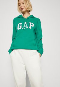 GAP HERITAGE JOGGER - Donji dijelovi trenirke - new off white