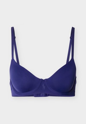 Modrček s utisnjenim košaricami v mornarsko modri barvi, nastavljivimi trakovi in subtilnim žičnim podloženjem, s finim embosiranim logotipom na sredini spredaj.