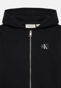 Calvin Klein Jeans BADGE ZIP THROUGH UNISEX - Sweatjakke - black