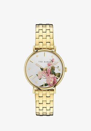 Reloj dorado con pulsera de eslabones de metal y un diseño floral en la esfera blanca. Las características incluyen marcadores y manecillas de horas en dorado.