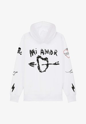 Sweatshirt alb cu glugă, decorat cu grafice negre, inclusiv "Mi Amor", inimi, săgeți, cranii și modele cu fulgere pe mâneci. Material din bumbac.