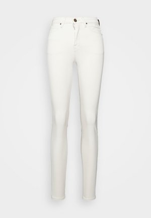 Jeans skinny de mezclilla blanca con cintura alta, con cierre de cremallera y botón. Textura lisa sin patrones o adornos visibles.