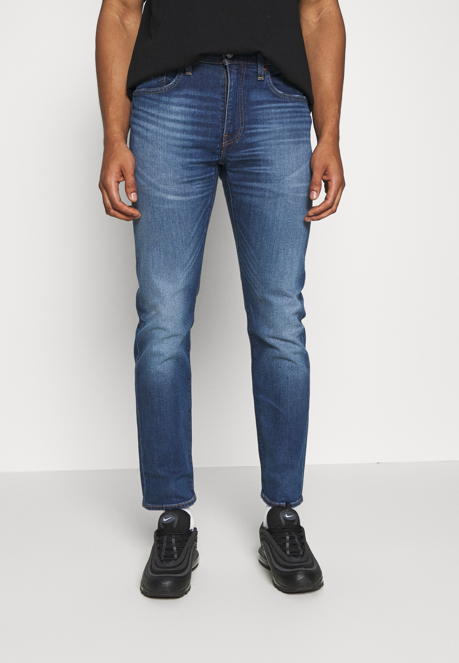 stacked slim jeans