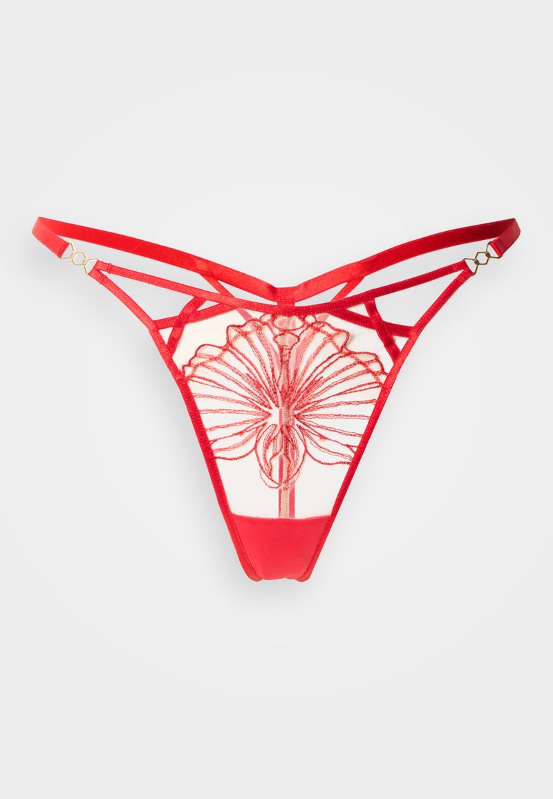 String rouge avec broderie florale, présentant un dos transparent et des détails à lanières. Le design comprend des accessoires métalliques de couleur or.