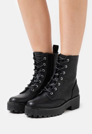 Platform ankle boots - black