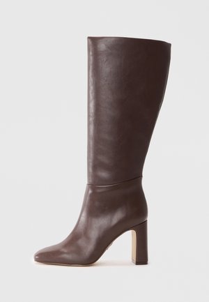 Brown leather ankle boot with a pointed toe and a high block heel, featuring a smooth texture and a fitted design.