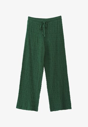 Grüne, strukturierte, weit geschnittene Hose mit einem Zugbandbund. Der Stoff hat ein gekräuseltes Muster, das ein weiches, leichtes Erscheinungsbild bietet.