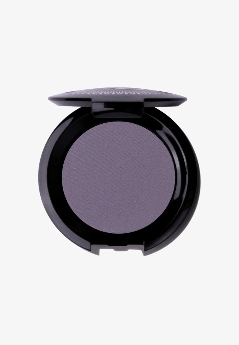 Round black compact containing a smooth, matte light purple eyeshadow. The lid features a textured design, providing a secure closure.