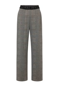 Weite Hose mit einem grauen Karomuster, ausgestattet mit einem schwarzen elastischen Bund mit Text. Das Material wirkt gewebt und hat eine glatte Textur.
