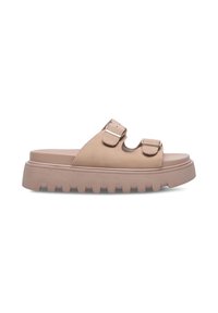 Sandale à semelle épaisse beige avec deux brides réglables à boucle et une semelle extérieure striée pour l’adhérence.
