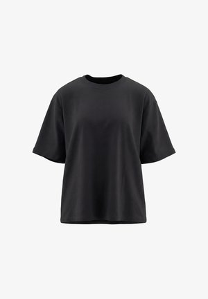 Sort oversized T-shirt med korte ærmer og rund hals i glat stof, vist mod en hvid baggrund.