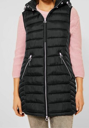 Schwarze Pufferweste mit Reißverschluss vorne, Kapuze und zwei seitlichen Reißverschluss-Taschen. Mit horizontalem Steppmuster und silbernen Hardware-Details.