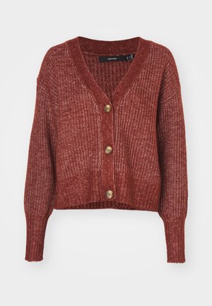 Cardigan lavorato a maglia color ruggine con scollatura a V profonda, maniche lunghe e cinque bottoni in legno sul davanti. Tessuto texturizzato con vestibilità corta.