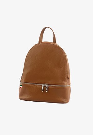 Brown leather backpack with a rounded shape, textured exterior, top handle, and a zipper pocket at the front. Features silver hardware.