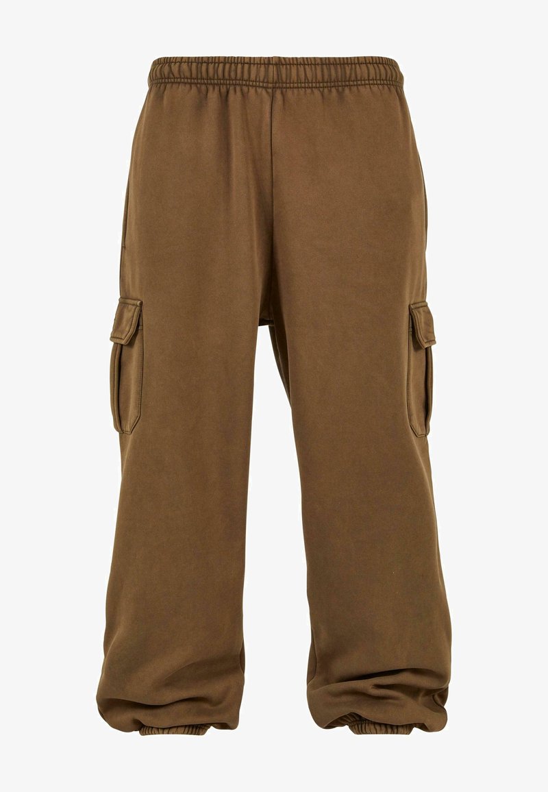 Ruske sweatpants laga pehmeast kangast, laieneva lõikega, elastse vöökoha, kitsenevate varrukaotstega ja külgmiste cargo taskutega.