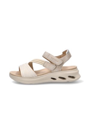 Sandalia beige de mujer con correas ajustables, suela acolchada y orificios de ventilación en la entresuela para mayor comodidad y transpirabilidad.