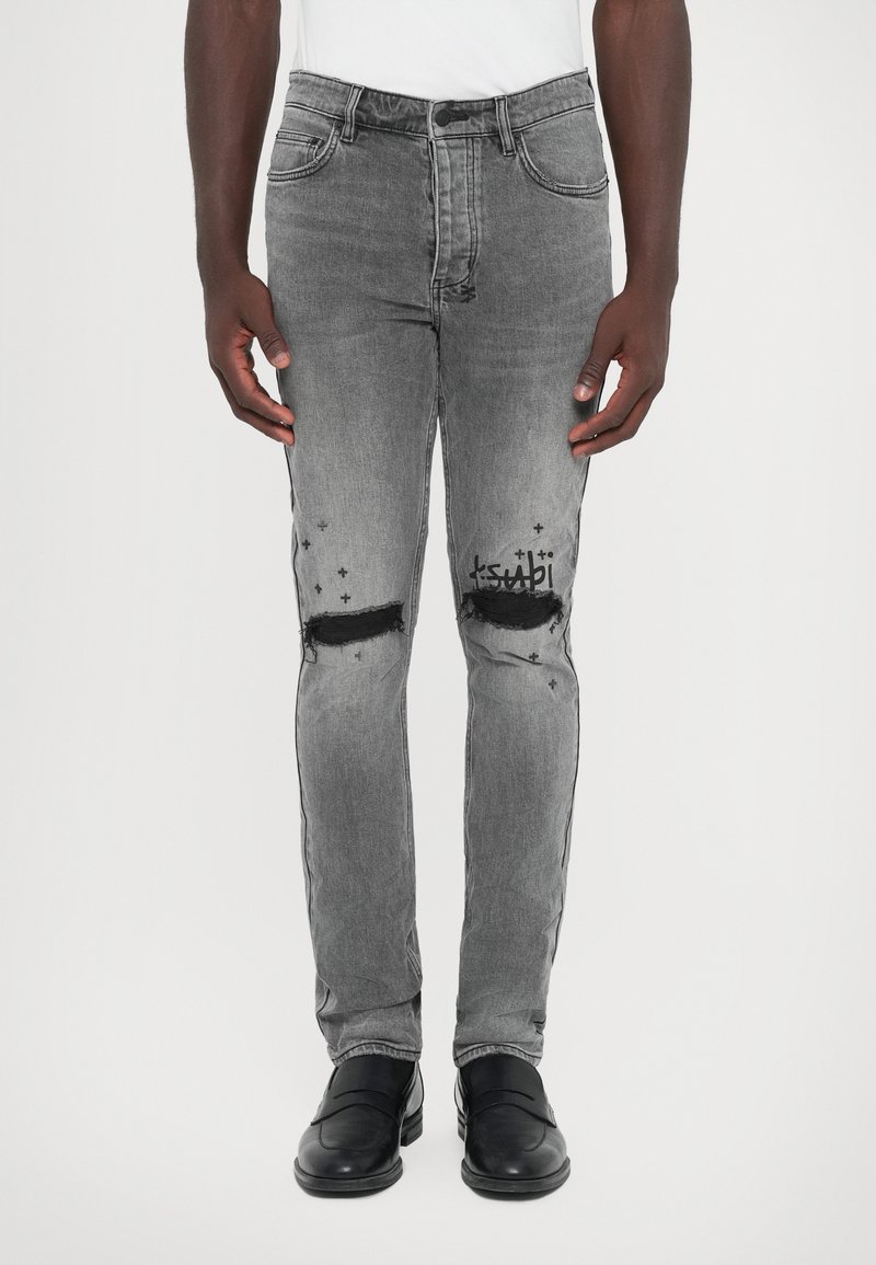 Graue Denim-Jeans mit Rissen an den Knien und dezenten grafischen Akzenten. Verfügt über ein klassisches Fünf-Taschen-Design und eine figurbetonte Silhouette.