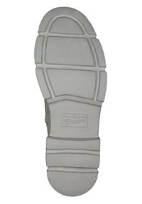 Sole of a shoe, gray rubber, textured with grooves and ridges. Logo “Tom Tailor Denim” embossed near the heel. Rounded toe design.