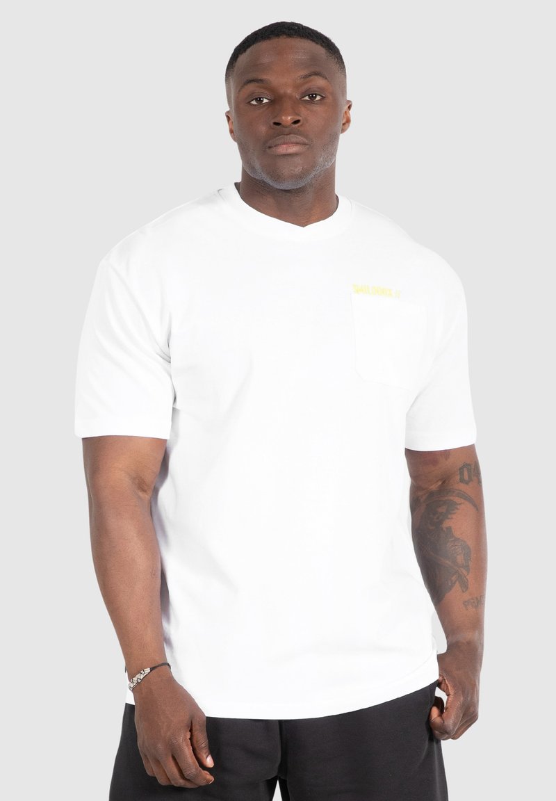 Shop Ellesse Coalio T-Shirt In Brown - Fast Shipping & Easy Returns
