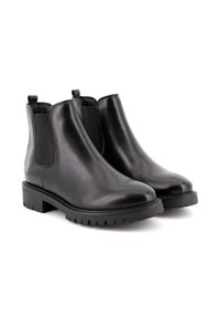 Stivaletti neri in pelle con pannelli laterali elastici, suola spessa con scanalature e linguetta sul retro per una facile vestibilità.