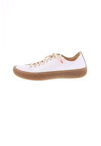 White leather sneaker with a textured finish, light brown rubber sole, and contrasting lace holes. Features a small red accent near the laces.