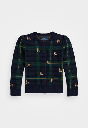 Gilet en tartan bleu marine avec un tricot texturé, mettant en avant des accents verts et jaunes. Motifs de chiens brodés et poignets côtelés. Cinq boutons.