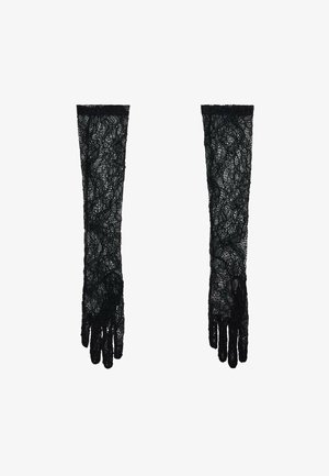 Guanti in pizzo nero con un design lungo, caratterizzati da intricate fantasie floreali e bordi ondulati. Texture morbida con aperture per le dita.