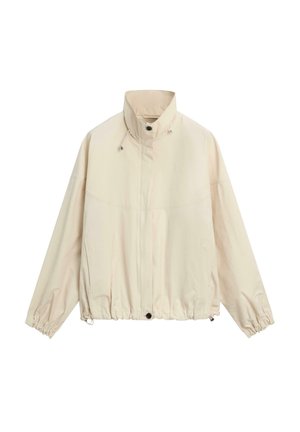 Lichtbeige windjack met hoge kraag, elastische manchetten, trekkoorden bij de kraag en zoom, en vooraan kliksluiting.