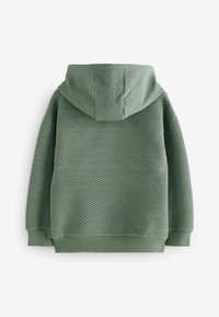 Hoodie vert texturé avec un motif en losanges, doté d'une capuche et de poignets côtelés. Les matériaux semblent doux et respirants.