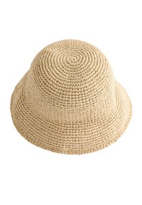 Straw bucket hat with a round top, natural beige color, tightly woven texture, and a wide, downward-sloping brim.