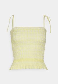 Top amarelo com franzido, alças ajustáveis, superfície texturizada e bainha ampla. Feito de tecido leve, adequado para o tempo quente.