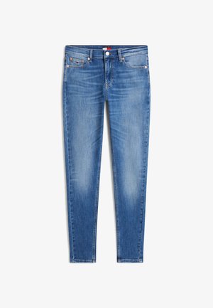 Jean en denim bleu coupe slim avec bouton et fermeture éclair à l'avant, légèrement délavé sur les cuisses et rivets en cuivre sur les poches.