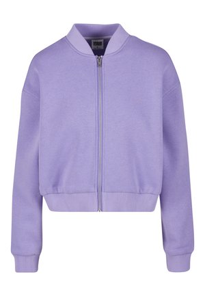 Lilla bumbleriiet valgest pehmest kangast, millel on ees lukk, ribikrae ja mansetid. Lühendatud disain ja mugav lõige.