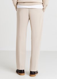 Calliope TINTA UNITA - Pantalon classique - corda