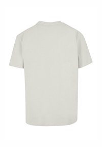 Tricou din bumbac gri deschis, cu mâneci scurte, guler rotund și o textură netedă, fără ornamente. Vedere din spate fără elemente de design.