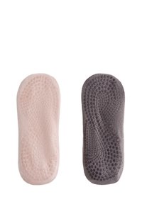 Due tappetini per i piedi, uno rosa chiaro e uno grigio scuro, entrambi con una superficie testurizzata. Ogni tappetino presenta piccoli punti rialzati per una migliore aderenza e una forma ergonomica per il comfort.