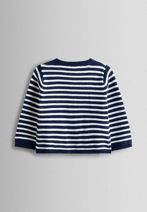 Tumesinise ja valge triibuline pikkade varrukatega kampsun, millel on soonikuga ümmargune kaelus ja varrukaservad. Kootud tekstuur; lühendatud lõige puhkevabas istuvuses.