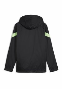 Zwarte capuchonjack met elastische zoom, voorzien van reflecterende neon groene accenten op de schouders. Gemaakt van lichtgewicht, waterafstotend materiaal.