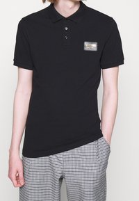 MOSCHINO Piké - black