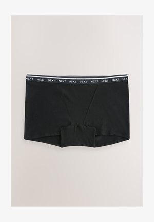 Black stretchy boxer briefs with branded elastic waistband labeled "NEXT" on a light background.