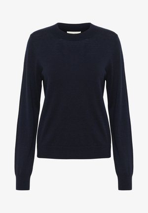 Tumedast sinine pika varrukaga sviiter ümarate kaelustega. Valmistatud pehmest kangast, ribitud mansetid ja ääred ning minimaalsed disainidetailid.