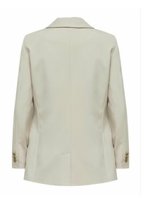 Blazer beige con colletto a scanno, silhouette strutturata, spacco posteriore singolo e quattro bottoni dorati sui polsini.