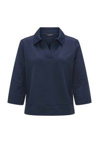 Pull bleu marine avec un col en V et un col, manches trois-quarts, tissu texturé et coupe décontractée. Design simple et épuré.
