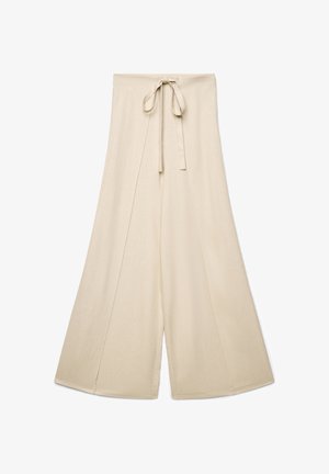 Pantaloni beige a gamba larga con vita alta e cintura in tessuto abbinato annodata sul davanti.