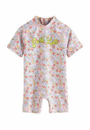 Kurzärmliger Kinder-Rashguard in pastellfarbenem Blumenmuster, mit rundem Hals und dem Text "Cath Kids" in leuchtendem Gelb auf der Vorderseite.