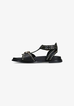 Zwarte leren sandalen met studded accenten, open teen en hakontwerp, platte zool en verstelbare enkelriem. Opvallende goudkleurige hardware.